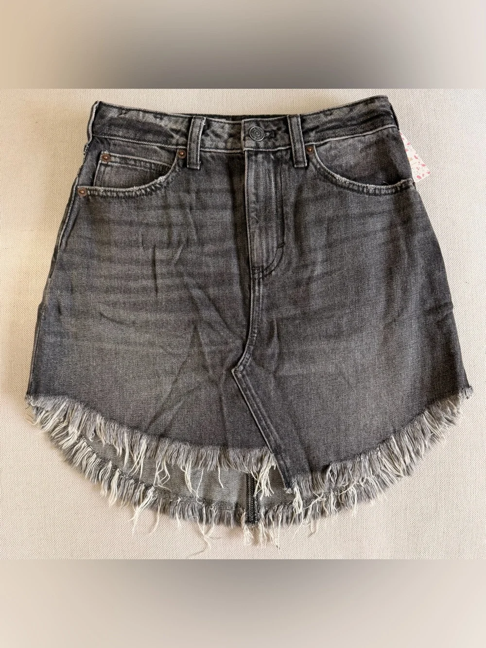 Free people Denim Fringe Hem Mini Skirt in color Maverick size 24 NWT